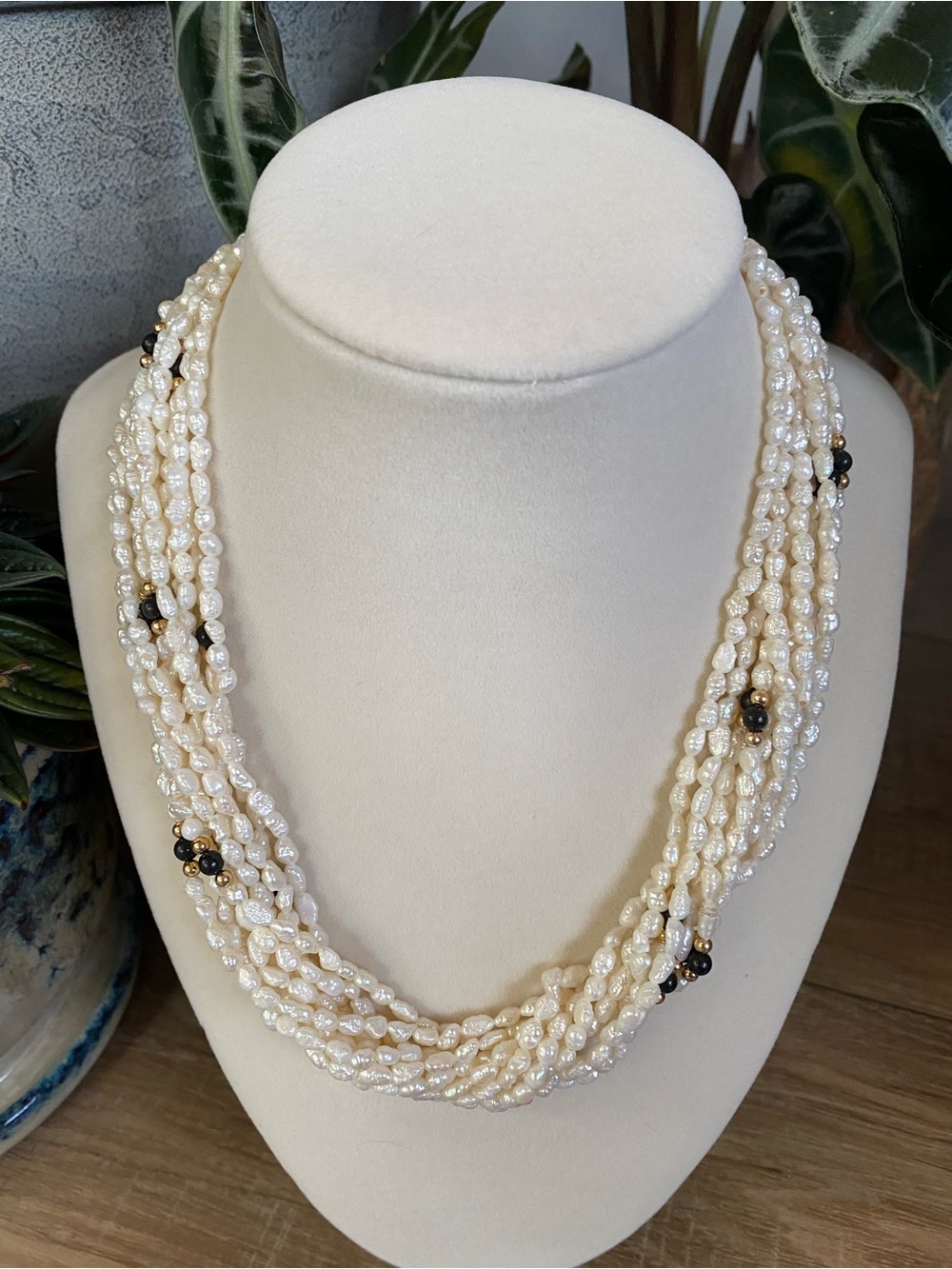 Cream Multi-Strand Pearl Necklace with Black Accent Beads